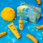 DOLCE MILK Set 243 (shower gel Hanna Banana 100 ml + hand cream Hanna Banana + sponge yallow) cosmetic bag
